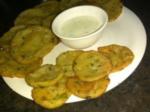 Aloo Puries With Curd Sauce