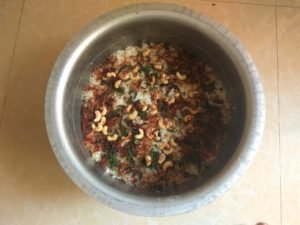 Mutton Biryani layered in vessel